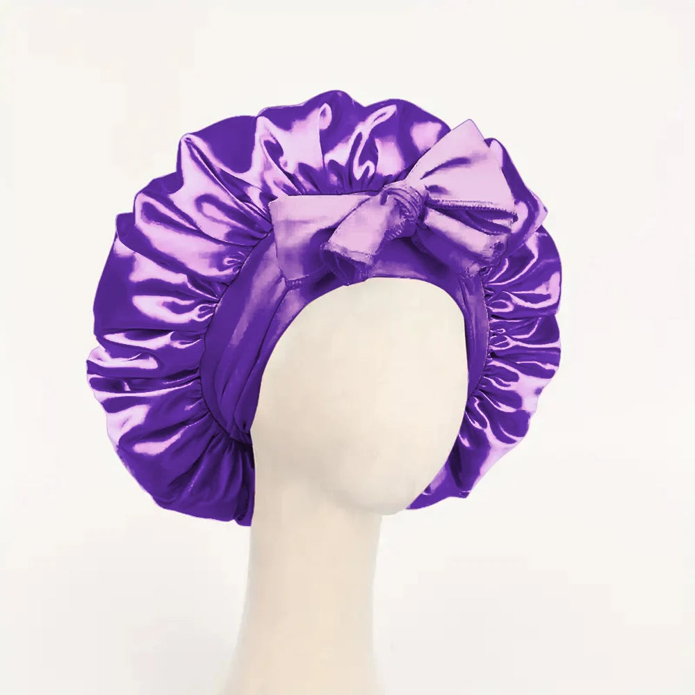 Purple adjustable satin bonnet for sleeping with bow detail by Sacred Self Wellness