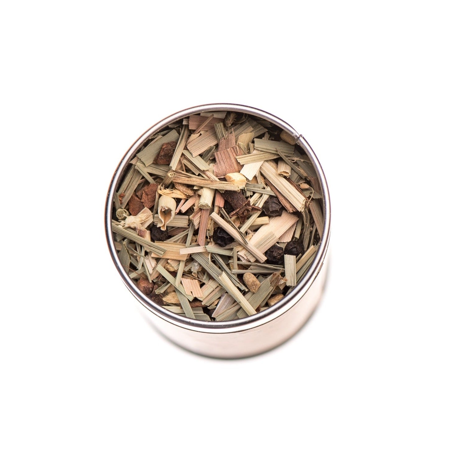 DC-PAAVANI Ayurveda rooibos chai blend with dried herbs and spices in a round metal container