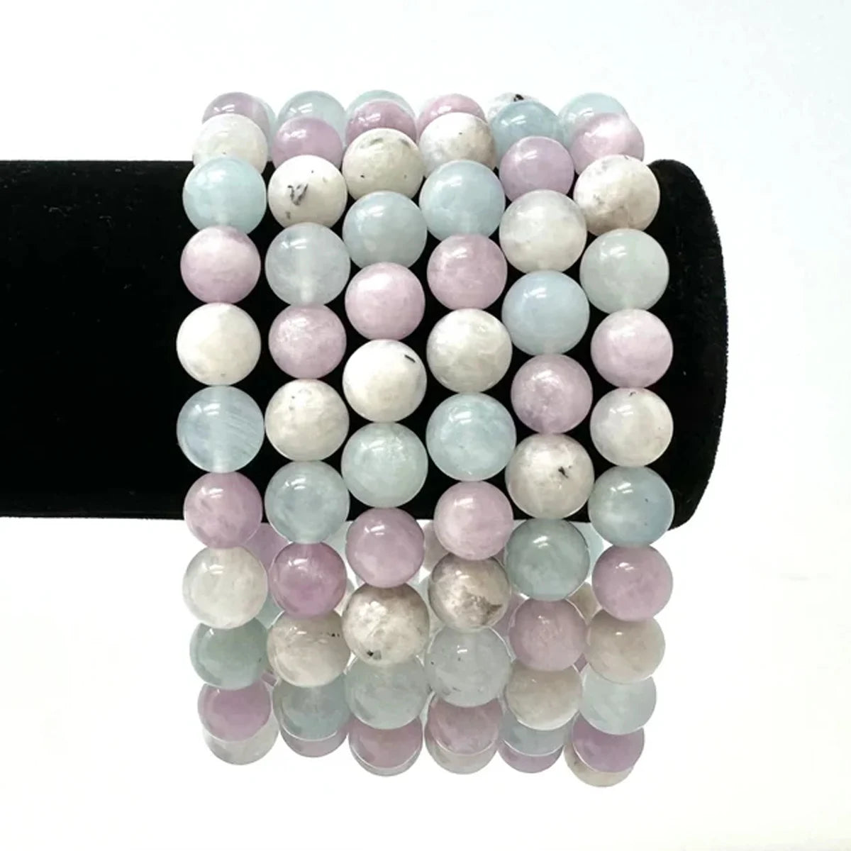 Pastel-colored crystal bracelet for mindfulness practice with soft pink, blue, and white beads