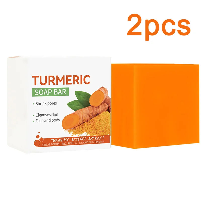 SACRED SELF WELLNESS handmade turmeric soap for skin lightening with two bright orange soap bars