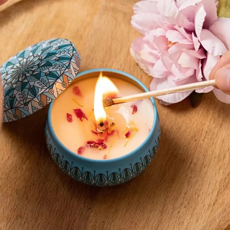 Islamic pattern scented candles in decorative blue container with floral petals and wooden matchstick lighting