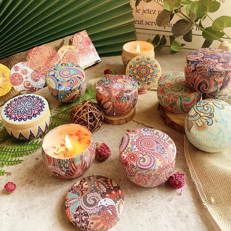 Colorful Islamic pattern scented candles in decorative round containers with intricate designs lit on table