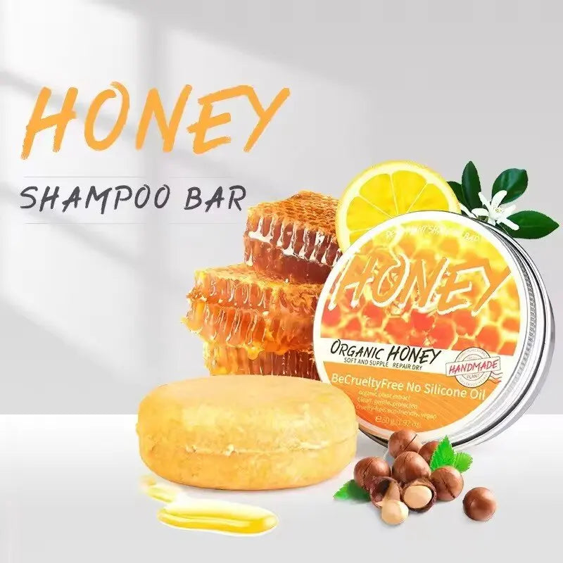 SACRED SELF WELLNESS natural honey shampoo bar with honeycomb, lemon slice, and nuts on a white background
