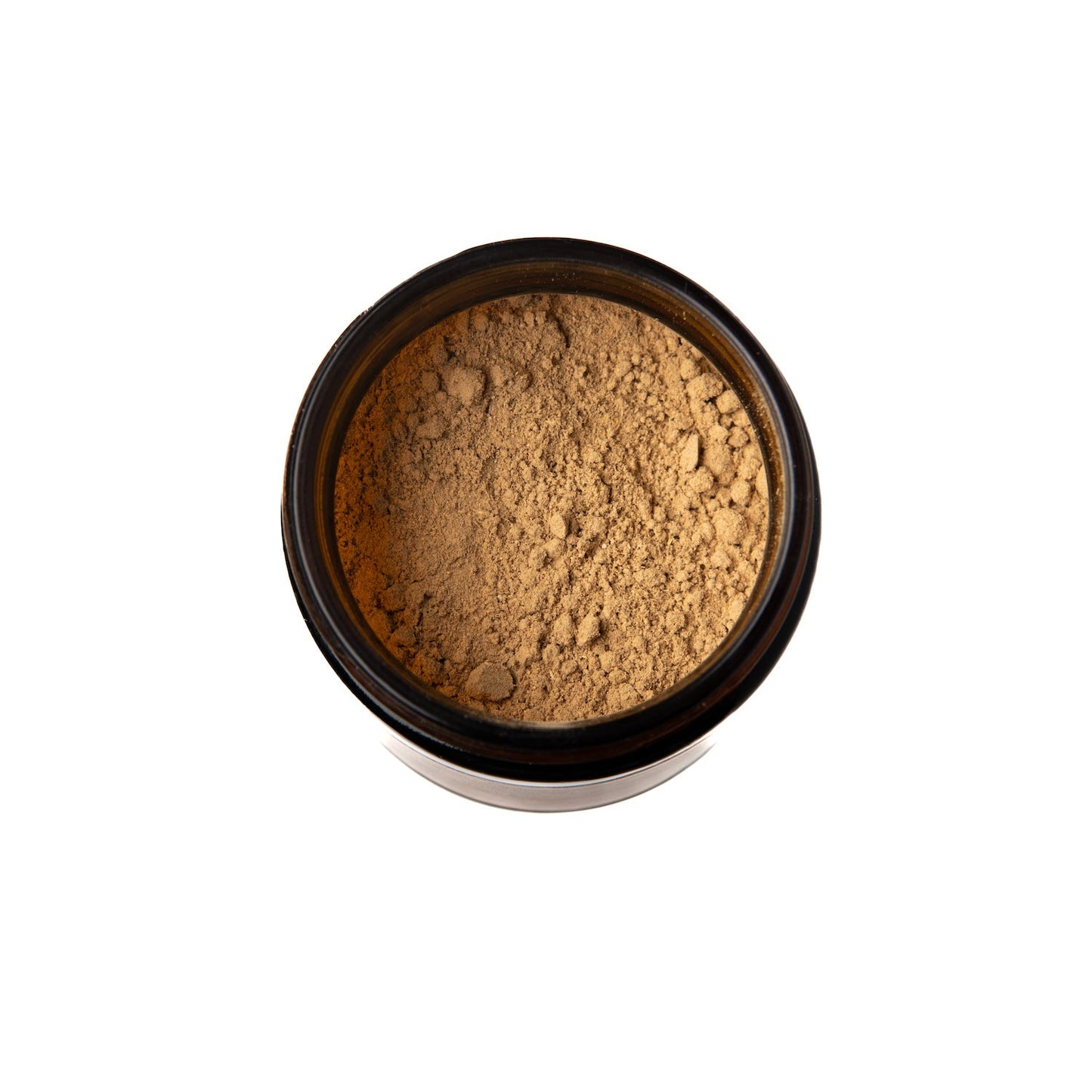 Top view of Vata spice blend for digestion in a brown glass jar by DC-PAAVANI Ayurveda