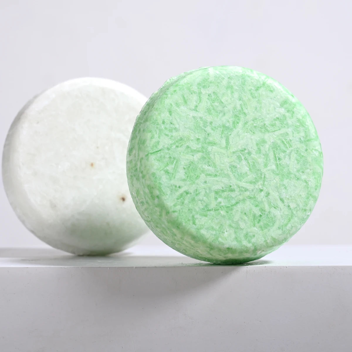SACRED SELF WELLNESS tea tree oil shampoo bar in green and white solid bars for natural hair care