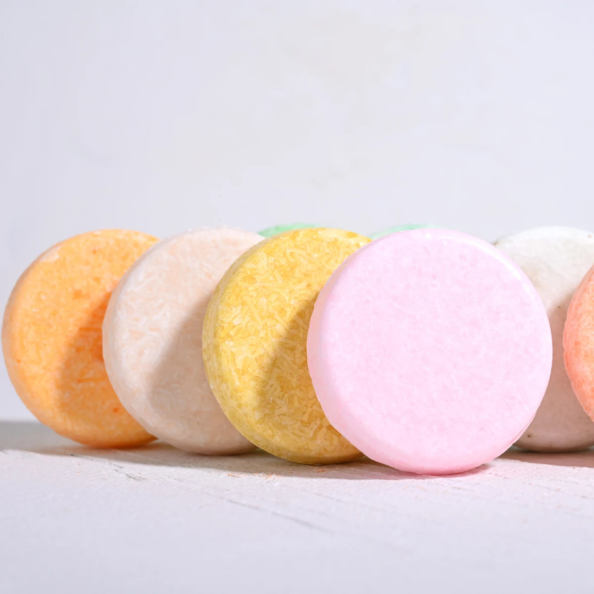 SACRED SELF WELLNESS colorful tea tree oil shampoo bar collection in round shapes for natural hair care