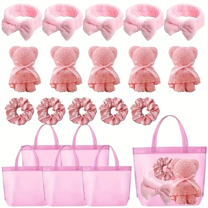 Pink spa gift set for women with headbands, teddy bears, scrunchies, and mesh tote bags