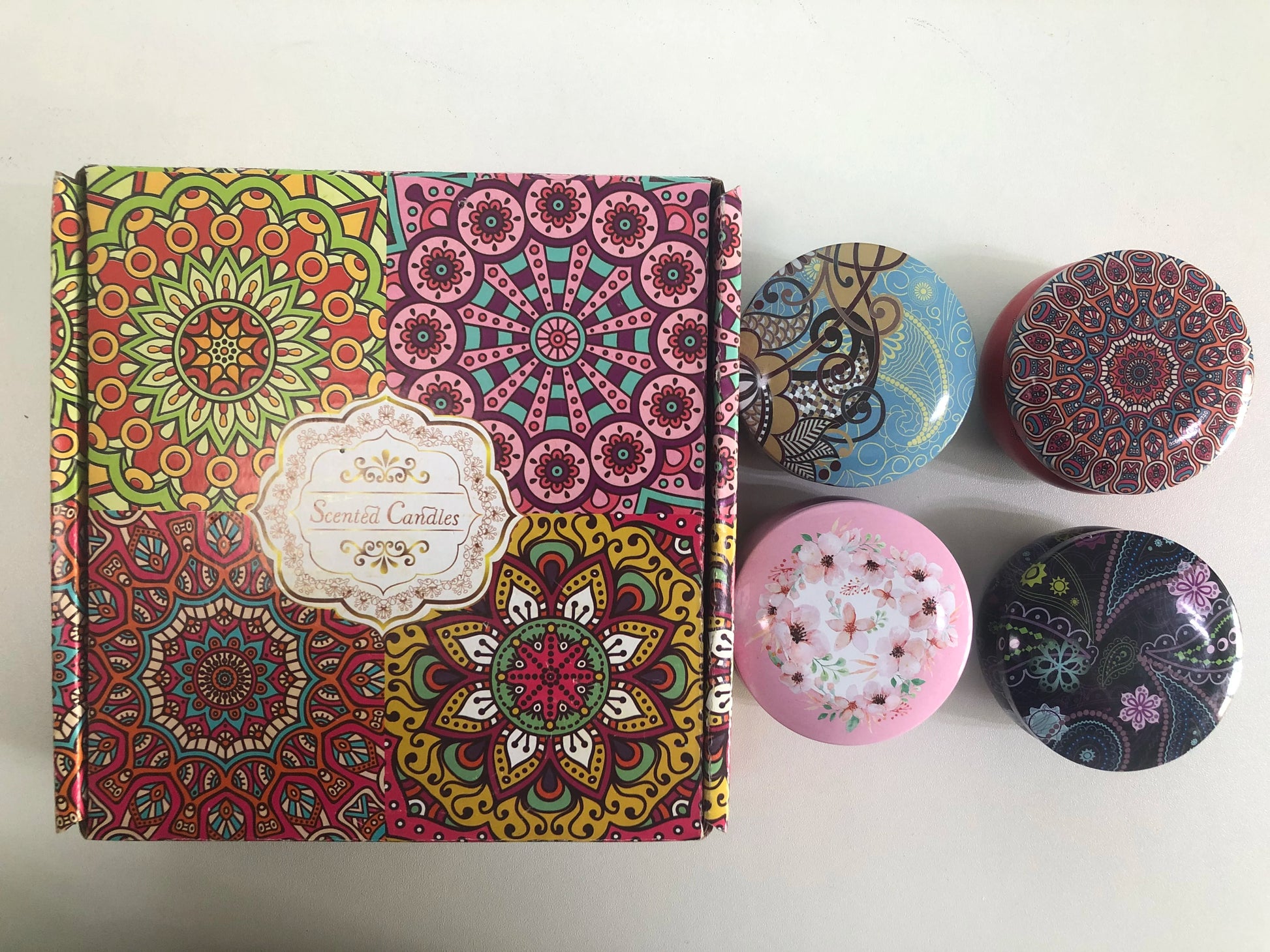 Sacred Self Wellness soy scented candles gift set with decorative patterned tins and colorful box