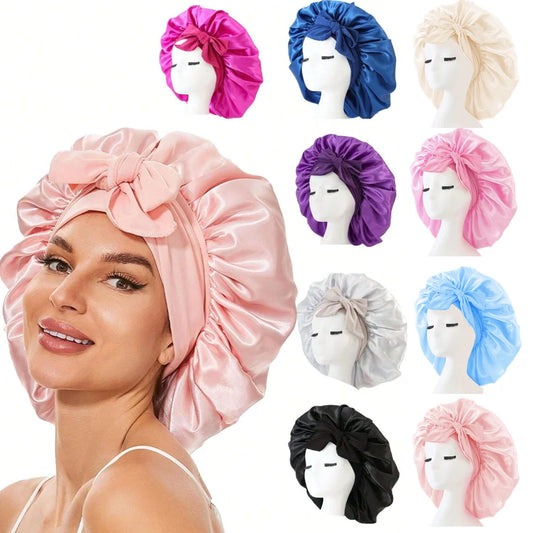 Adjustable satin bonnet for sleeping in various colors including pink, blue, black, purple, and beige