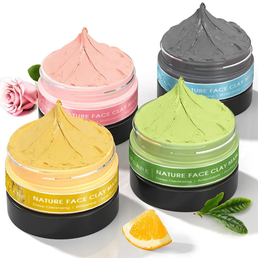 Clay facial mask set with four colorful jars in pink, yellow, green, and gray for deep cleansing and skincare