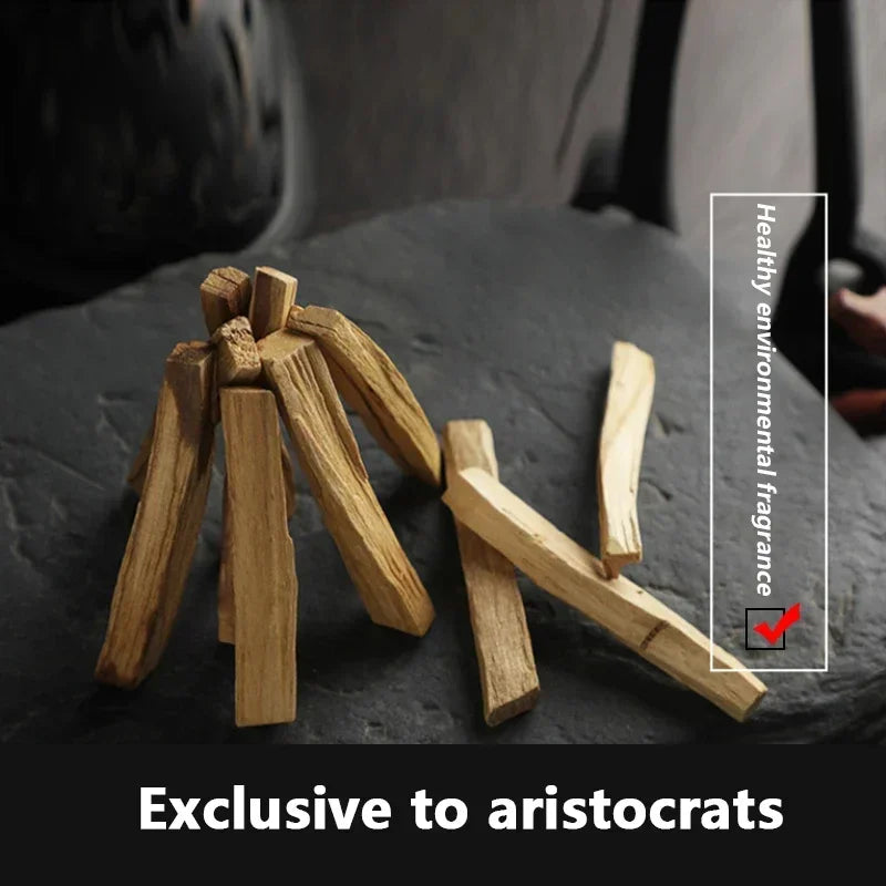 SACRED SELF WELLNESS palo santo incense sticks arranged on a dark surface for healthy environmental fragrance