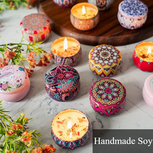 Colorful Islamic pattern scented candles with intricate designs burning on a marble surface