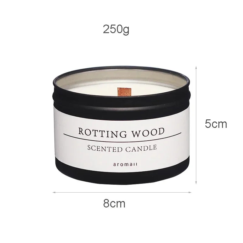 Scented candle with dried flowers in a black container labeled Rotting Wood, 250g size