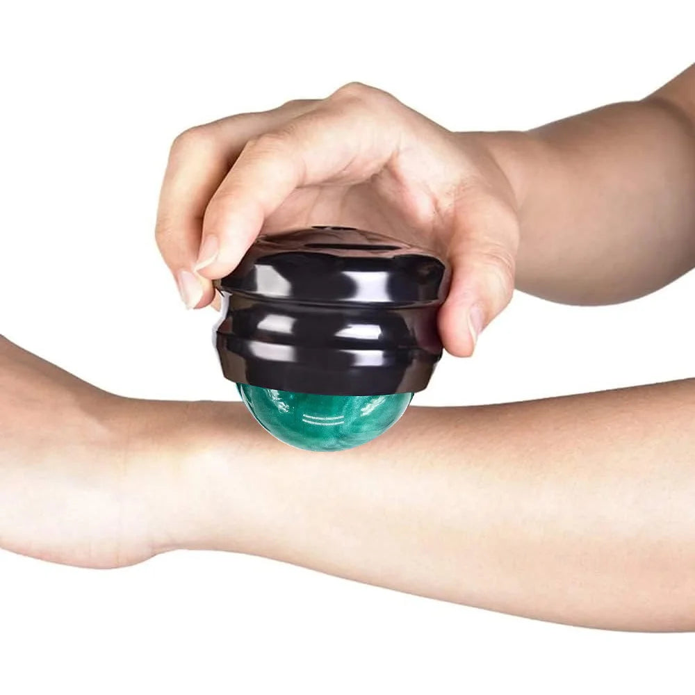 Sacred Self Wellness massage roller ball for muscle relaxation being used on forearm