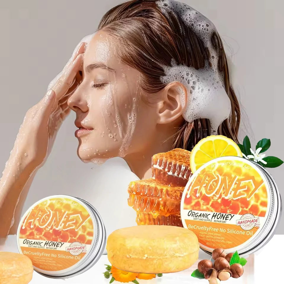 Woman washing hair with natural honey shampoo by Sacred Self Wellness alongside honeycomb and soap