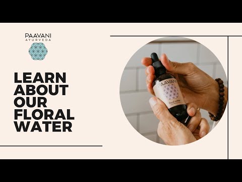 Person holding DC-PAAVANI Ayurveda botanical floral water for skin bottle with dropper cap