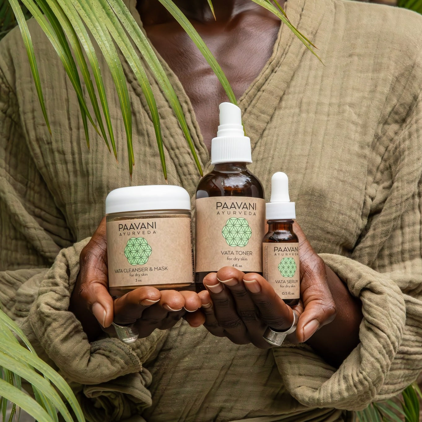 DC-PAAVANI Ayurveda vata facial ritual set with cleanser mask toner and serum held by person