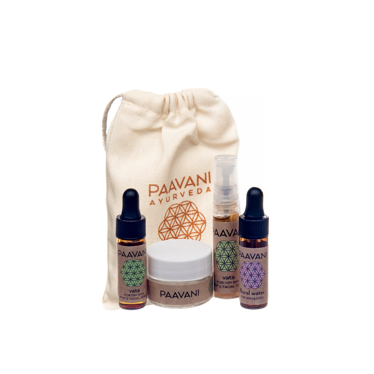 DC-PAAVANI Ayurveda vata facial ritual set with natural oils cream and floral water in front of branded drawstring pouch