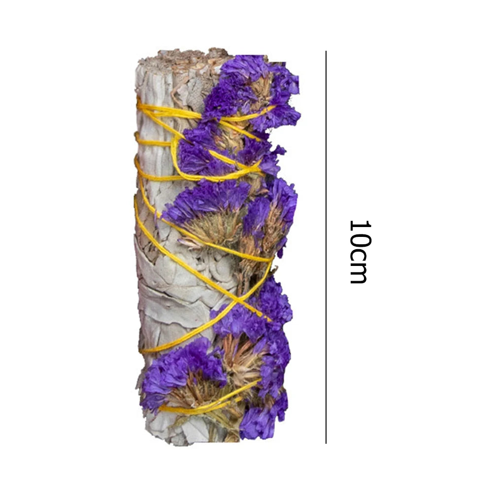 Palo santo white sage smudge stick with purple flowers wrapped in yellow string measuring 10cm