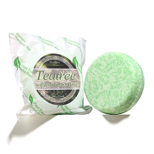 Sacred Self Wellness tea tree oil shampoo bar with green solid shampoo and eco-friendly packaging