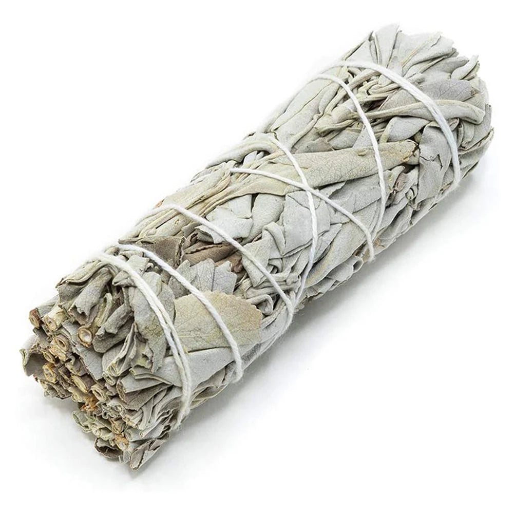 Palo santo white sage smudge stick bundle tied with white string for cleansing and meditation